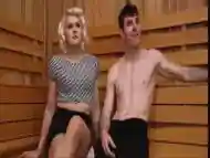 Bulky blonde t-girl bangs a dude''s ass in the sauna