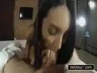 Busty ladyboy gives a handjob and a blowjob to her master