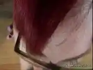 Red-haired shemale shamelessly jerks off for pleasure of viewers