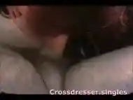 Crossdressing redhead shemale facialized after giving a long erotic blowjob