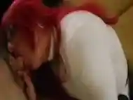 Crossdressing redhead shemale passionately slobbers on a big fat cock