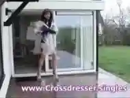 Crossdressing shemale pulls her dick outdoors to stroke it hard