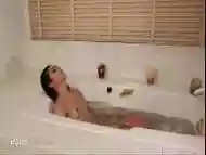 Cute ladyboy Aubrey loves pissing in the bathtub and teasing