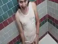 Sensual shemale gets all wet in a shower and masturbates