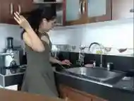 Shemale gets turned on and masturbates hard in the kitchen