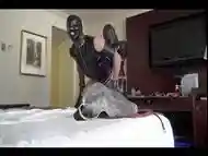 Strap-on Mistress and her slave enjoy latex fetish and asphyxiation