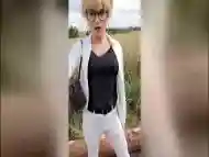 Tranny Wetting in hot white jeans !! Pissed in full public!