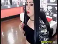 Brunette Tranny jerking a nine inch cock