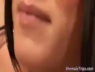 Busty shemale sucks dick