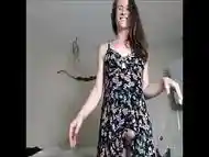 Shemale in a Floral Dress Showing You Her Pretty Cock