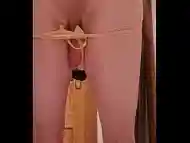 Sissy crossdresser plays with ass