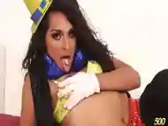 Creative shemale eats some candy while doing some seductive masturbation