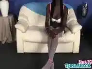 Black shemale plays with her big stiff dick