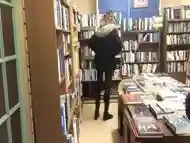 Crossdresser flashing in bookstore