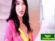 Ladyboy jerking until she cums over stomach